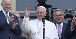 Pope Francis, accompanied by, from left, Vice President Joe Biden, Senate Majority Leader Mitch McConnell of Ky., House Majority Leader Kevin McCarthy of Calif., and House Speaker John Boehner of Ohio, speaks to the crowd from the Speaker's Balcony on Capitol Hill, Thursday, Sept. 24, 2015, after his address to a joint meeting of Congress making him the first pontiff in history to do so. (AP Photo/Susan Walsh)